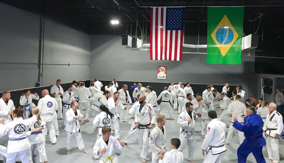 Professor Tony assisting Master Royce Gracie
